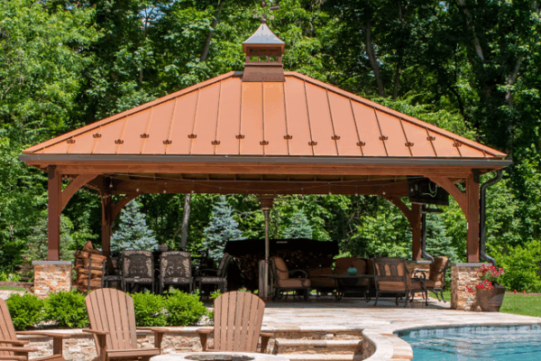 front of a beautiful wooden cheyenne garden pavilion in front of a pool for sale from Lancaster county backyard