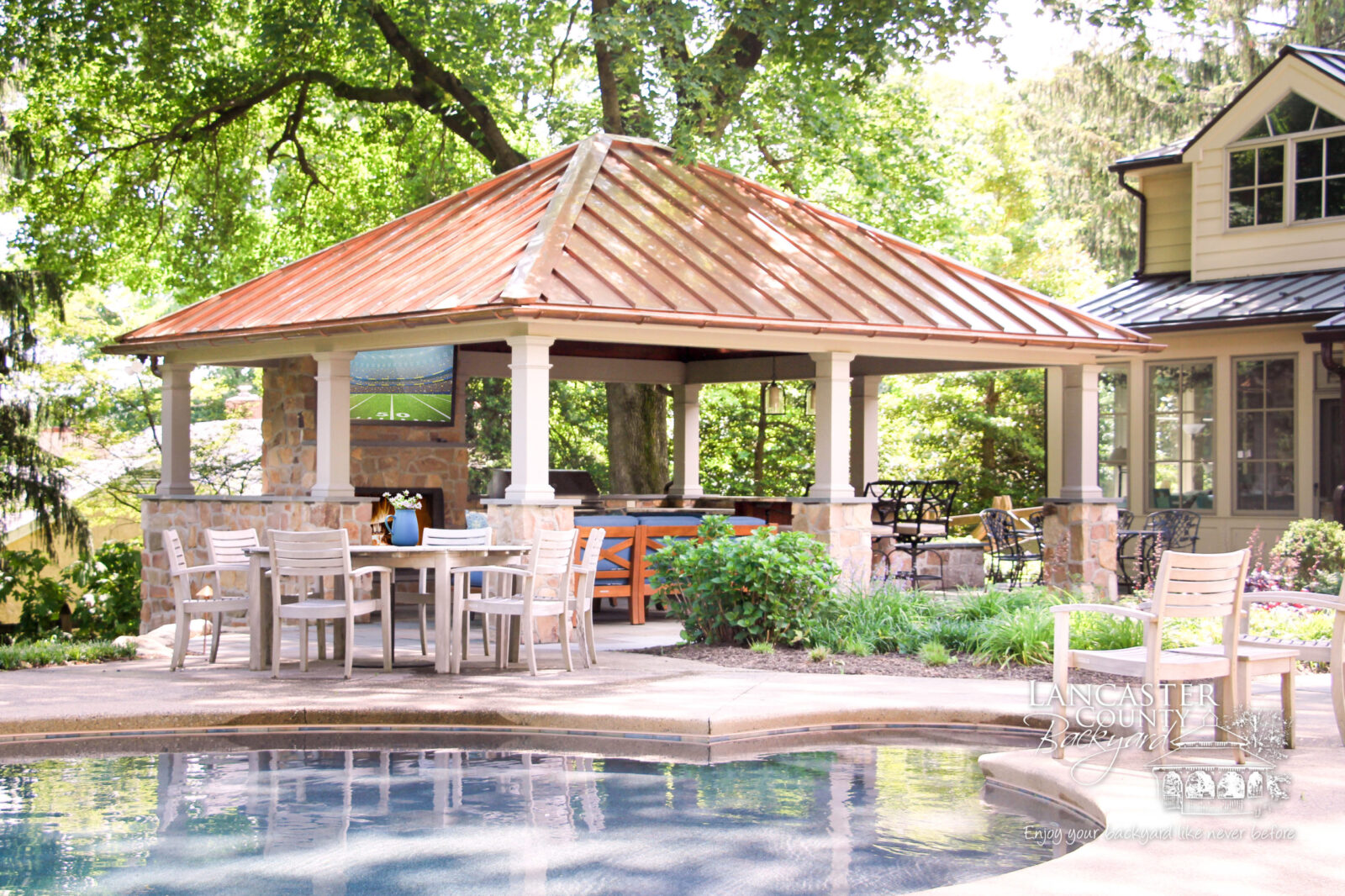 caribbean vinyl pavilion with outdoor fireplace