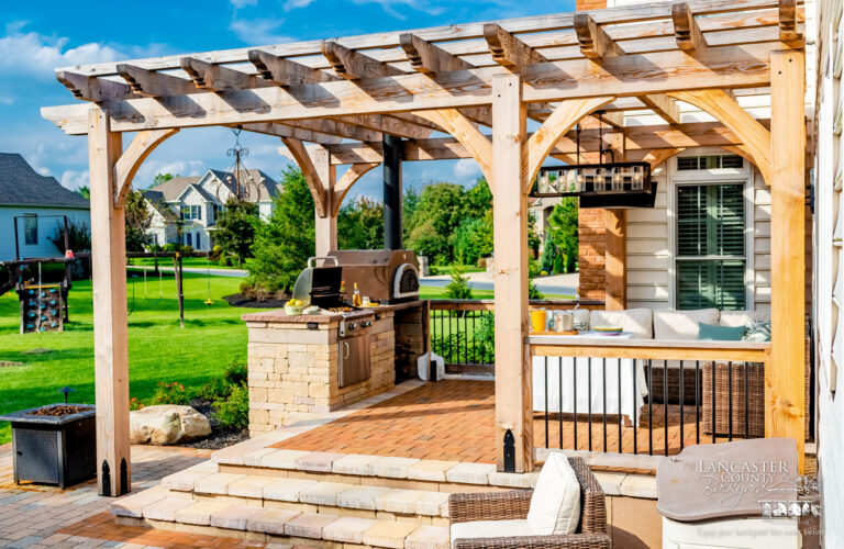 Beautiful outdoor kitchen under a pergola scaled 768x500 f50 50