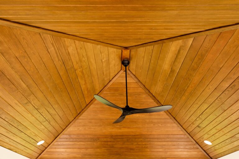 caribbean pavilion with a ceiling fan
