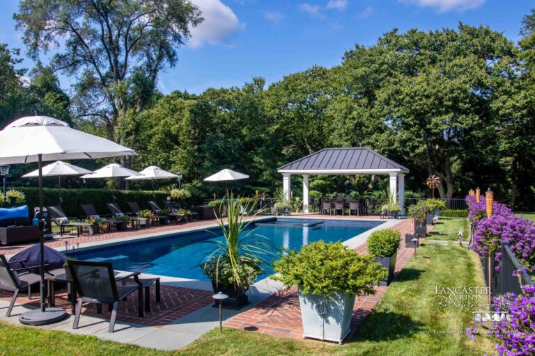 12x20 caribbean vinyl pavilion with beautiful landscaping
