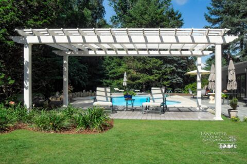 large pergola by a pool what is the purpose of a pergola