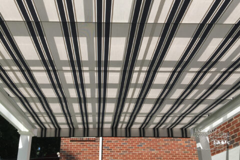 vinyl backyard patio pergola featuring navy taupe fancy shad can