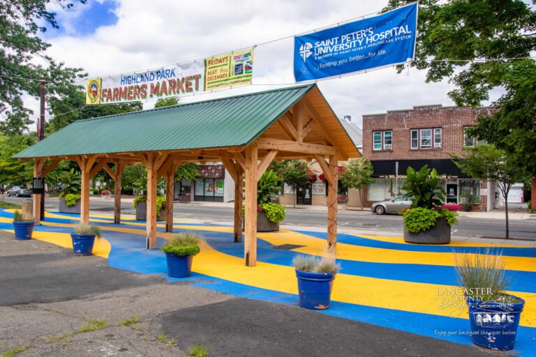 large timber frame pavilion structure at a farmers market in new jersey