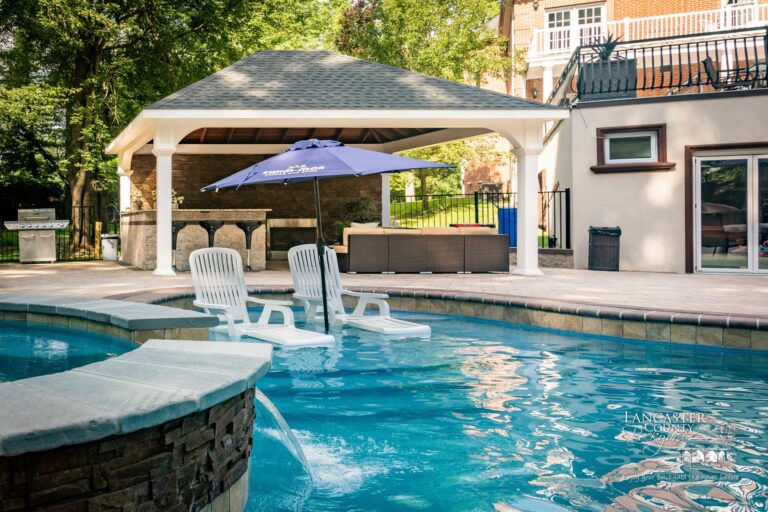 vinyl pavilion with an outdoor kitchen and fireplace