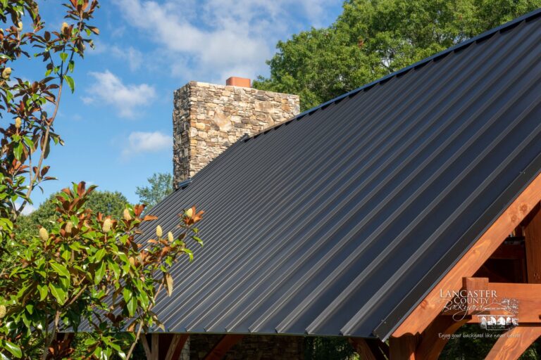 timber frame backyard pavilion with metal roof