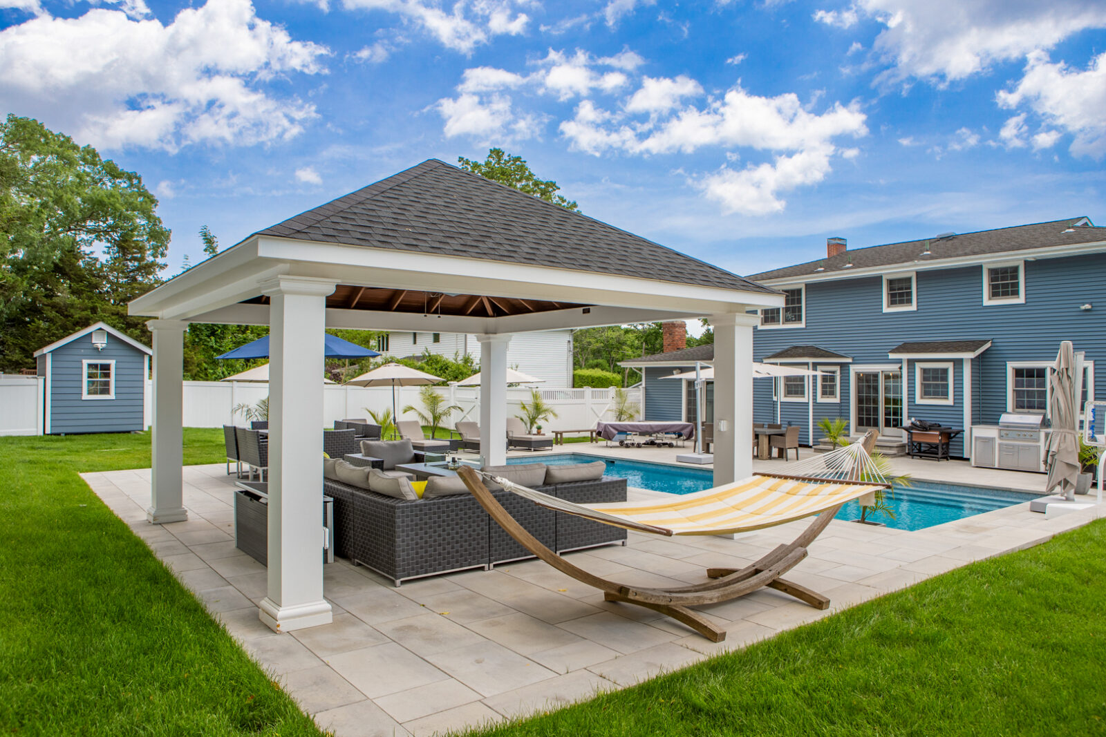 caribbean style pool pavilion with hammock