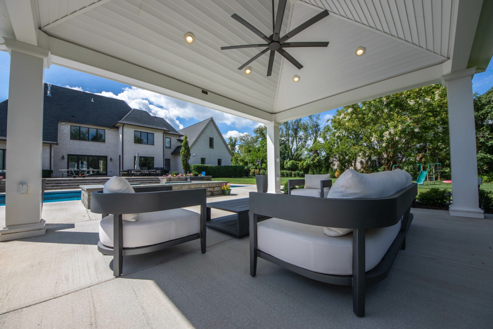 modern pavilion with ceiling and living area