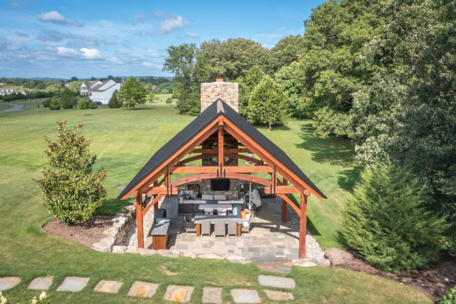 outdoor kitchen pavilion with fireplace