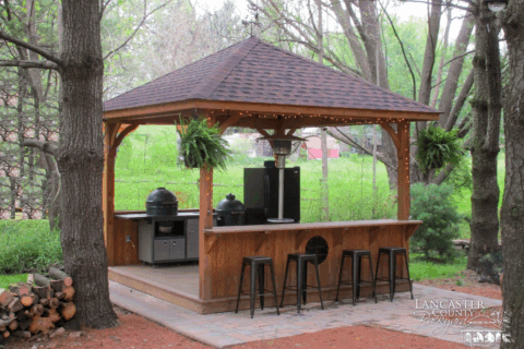 Photo Gallery of Outdoor Pavilions For Sale in Virginia 1, Pavilion in woods with bar stools and lights