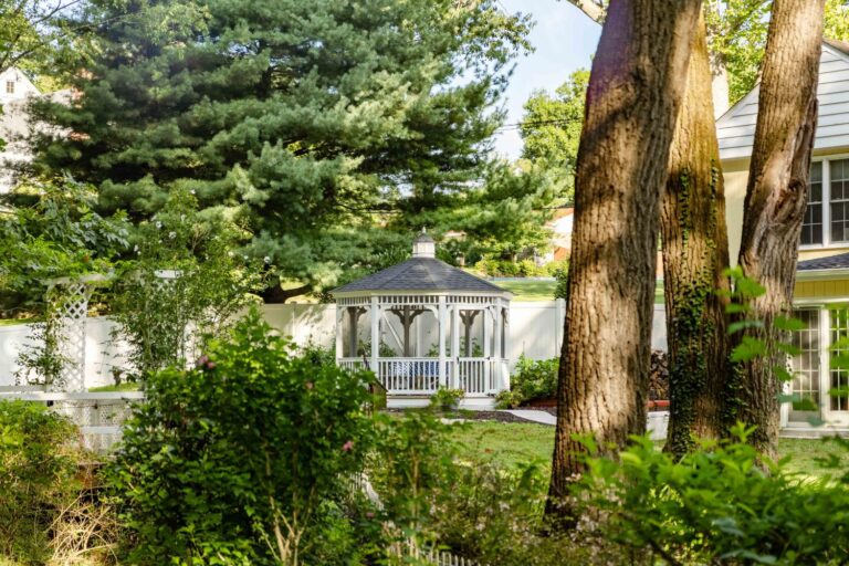 12' Octagon Vinyl Gazebo in yard