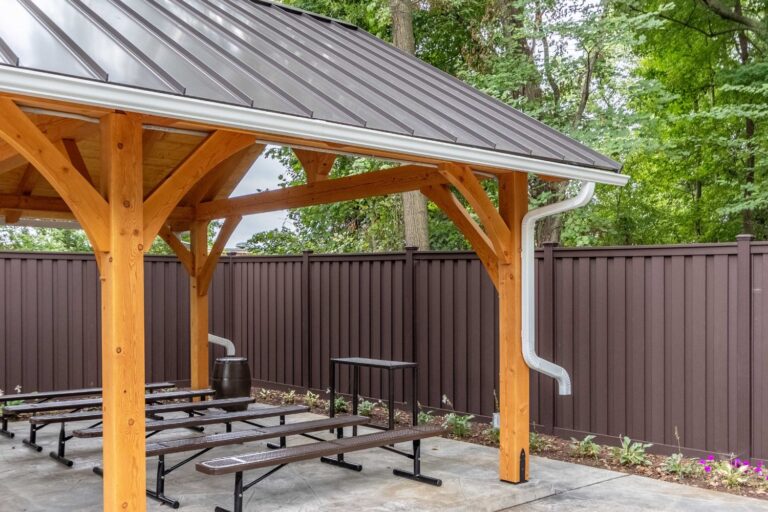 Gutters and rain barrel attached to 20x24 Kingston Timber Frame Pavilion