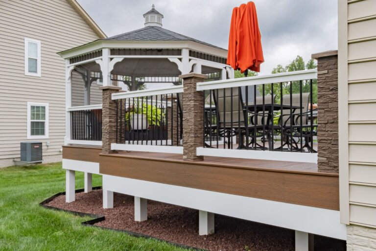 side of deck extending to 14' Octagon Vinyl Gazebo