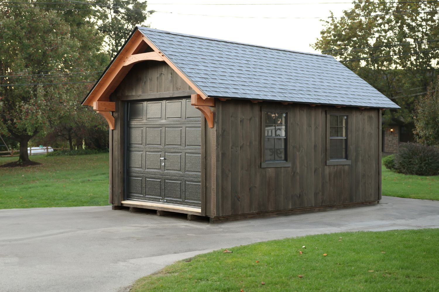The York Timber Frame Shed with Garage Door in Driveway