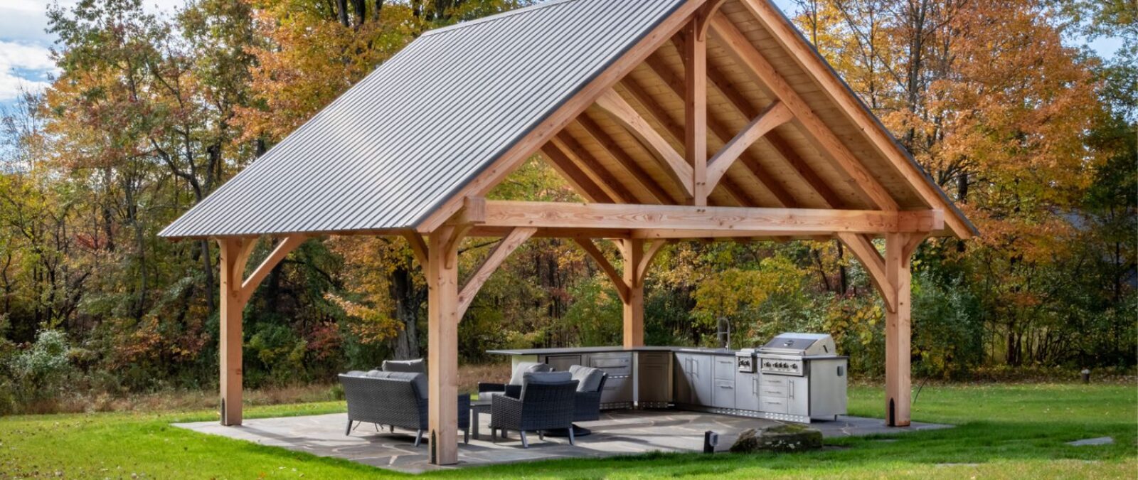 The Kingston Pro Timber Frame Pavilion with metal roofing and outdoor kitchen