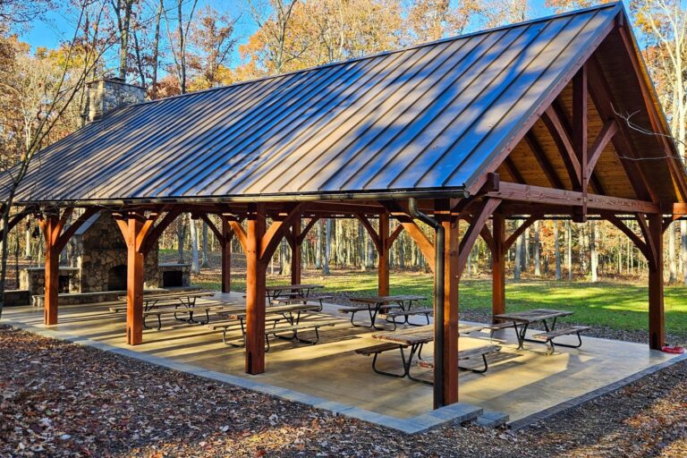 Side of 30x50 Kingston Pro Timber Frame Pavilion in Mill Hall PA with picnic tables and fall leaves