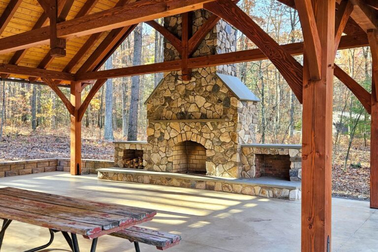 Side view of fireplace inside kingston pro timber frame pavilion