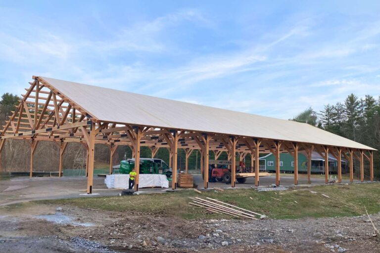 View of construction and half-roofed timber frame pavilion in Copake NY