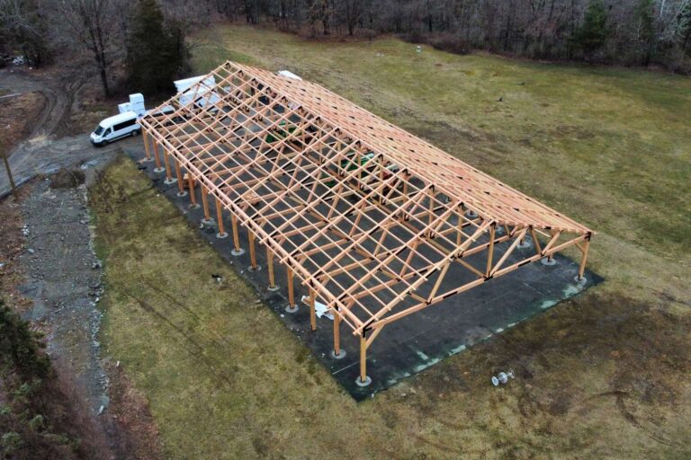 overhead shot of frame of 70x140 Kingston Timber Frame Pavilion in NY during construction