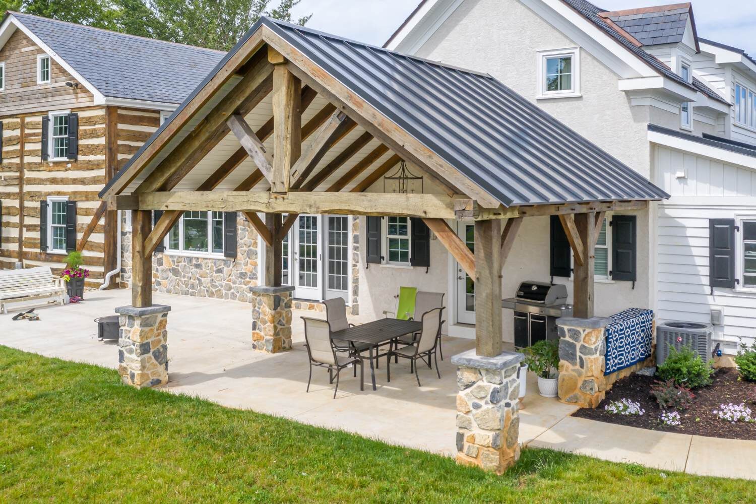 timber frame pavilion attached to home