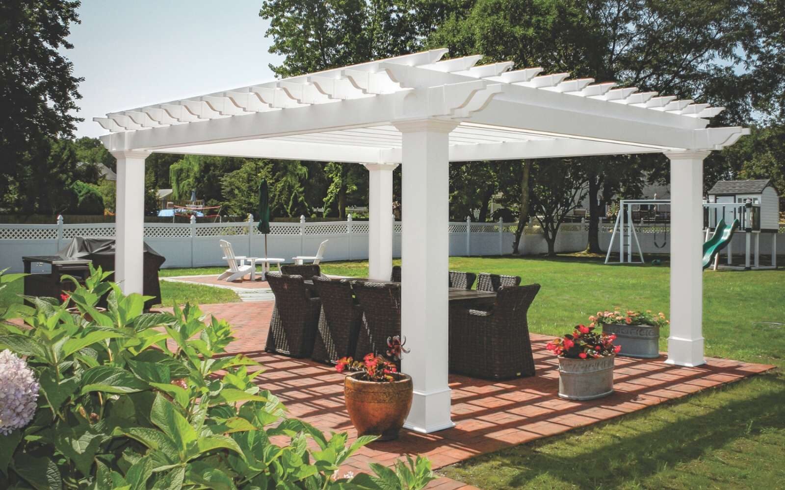 Vinyl Pergola over outdoor eating area in backyard