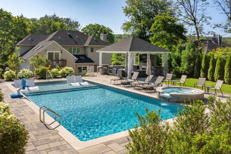 18x18 caribbean vinyl pavilion captured from across the pool