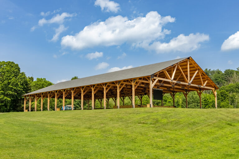 70x140 kingston pavilion in a grass field in Copake NY