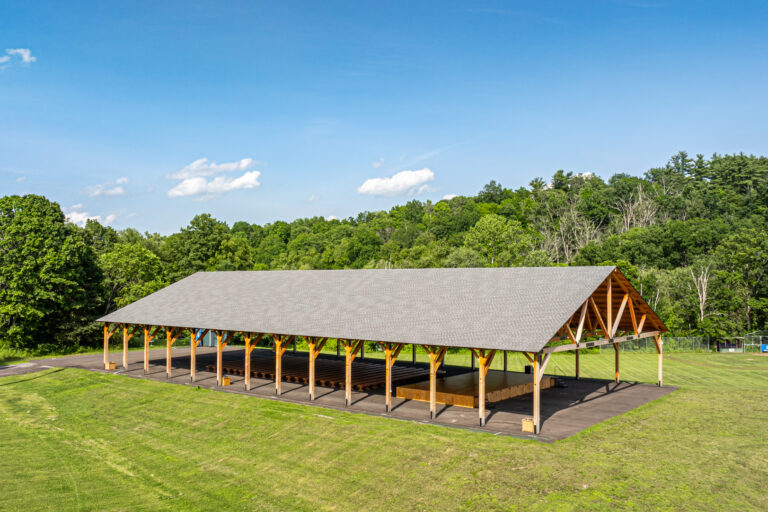 sideways drone shot of a 70x140 pavilion in Copake NY