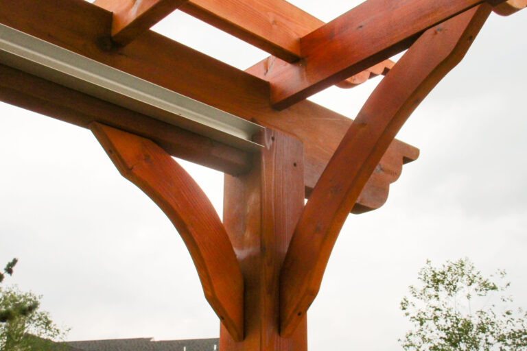 collegeville backyard pool with a wooden pergola