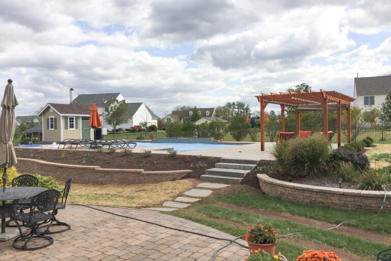 pergola cedar post on a stamped patio