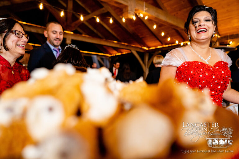 happy couple in a timber frame pavilion