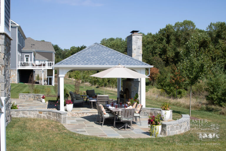 vinyl montford pavilion with a fireplace