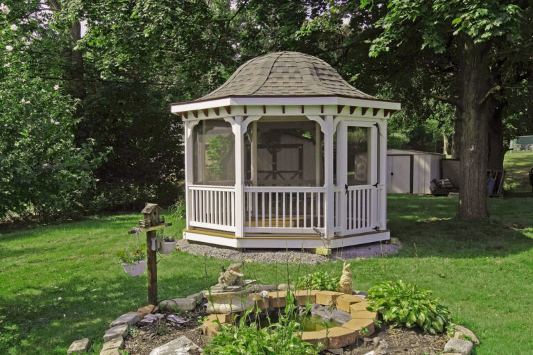 vinyl octagon gazebo in backyard