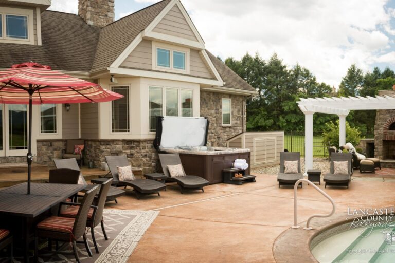 pergola and pavilion with a hot tub