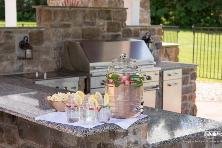 pergola and pavilion with a beautiful pool and outdoor kitchen