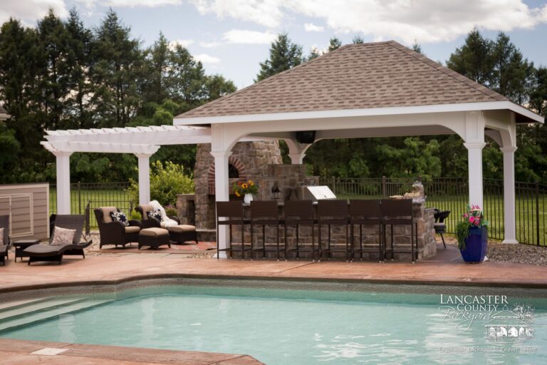 poolside pergola and pavilion with outdoor kitchen