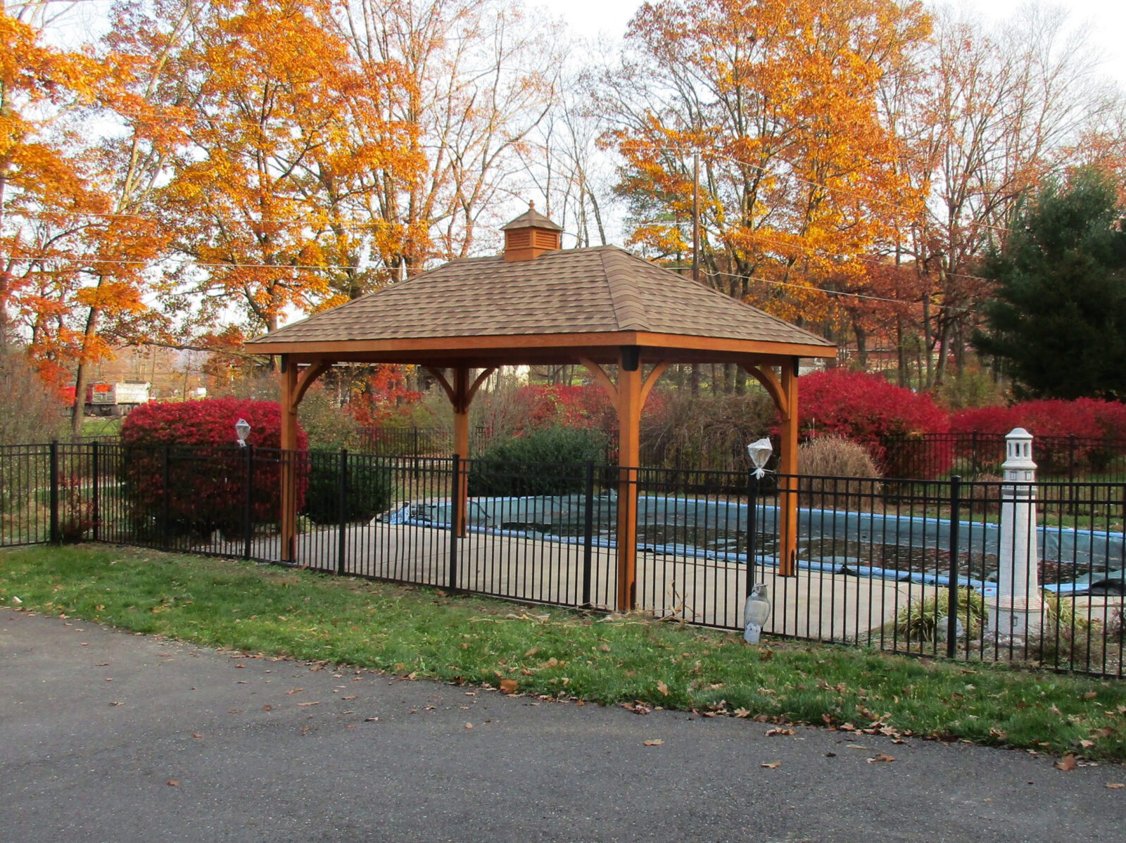 wooden amish pavilion by pool