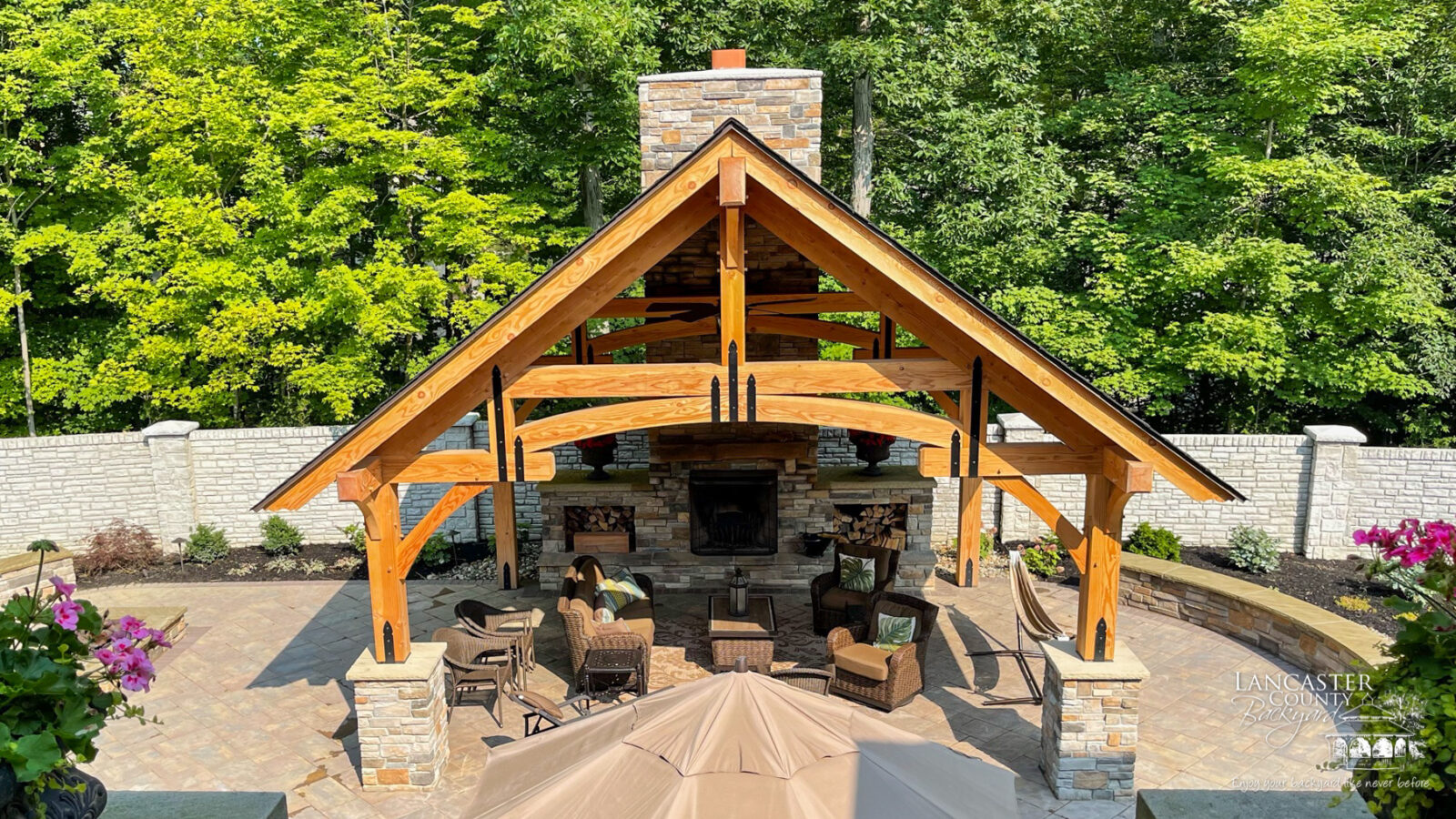 timber frame pavilion with a fireplace