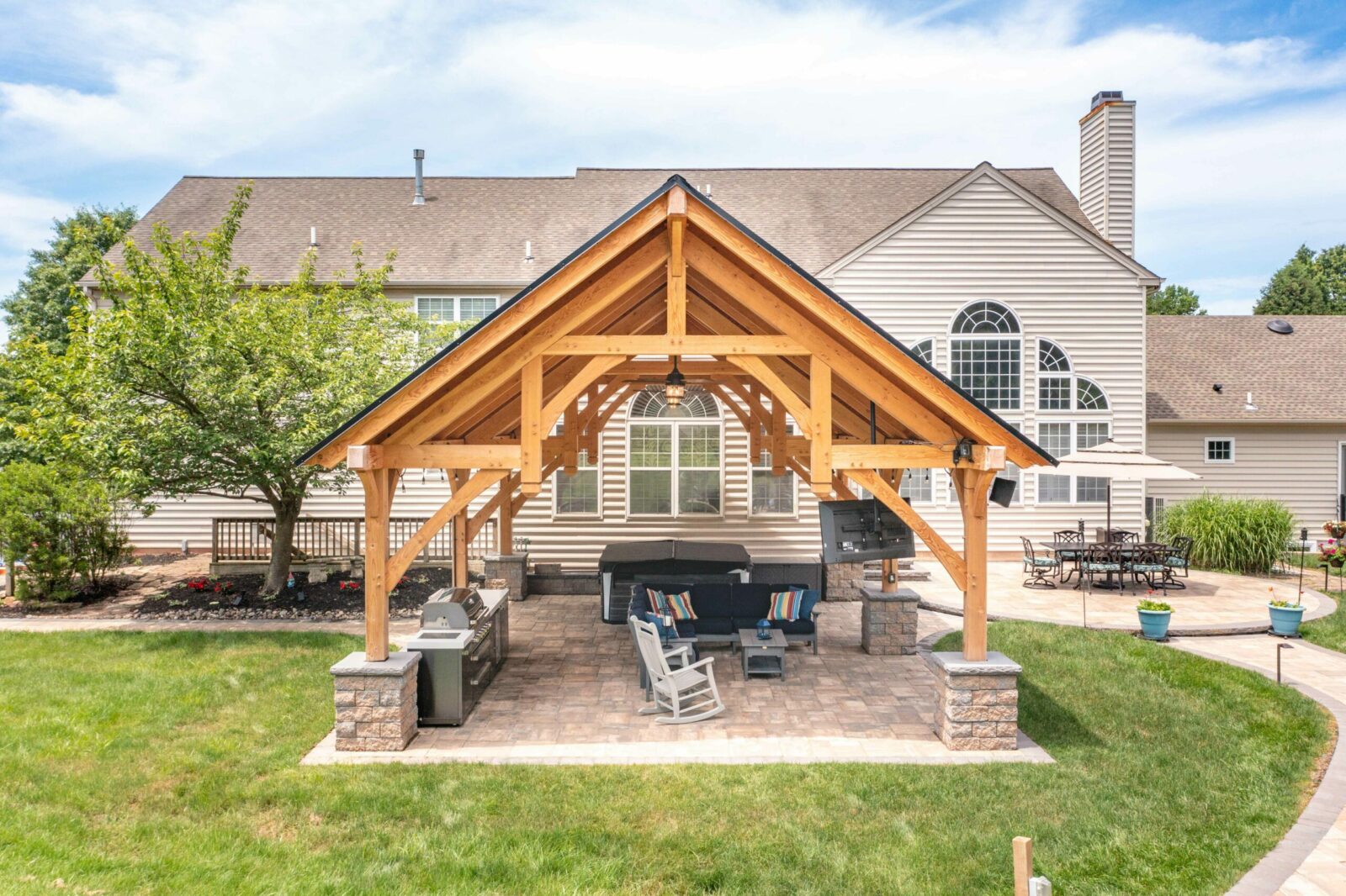 timber frame outdoor kitchen pavilion with grill
