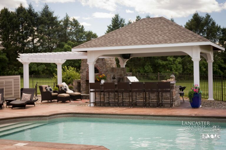 poolside pergola and pavilion with outdoor kitchen