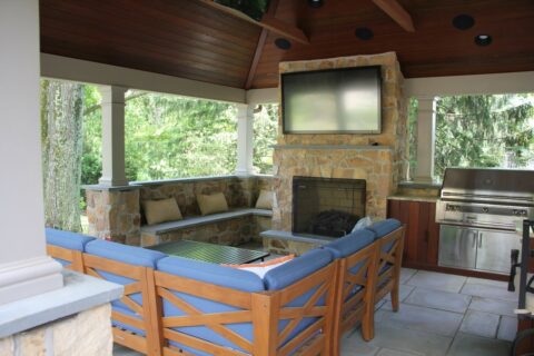 seating area outdoor fireplace under pavilion